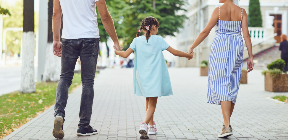 Parent holding child's hand — educational evaluations