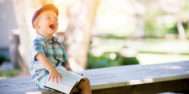 Happy child laughing — educational consulting for families